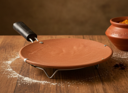 Clay Tawa With Handle for Roti – 9 inch on a wooden table, perfect for traditional Indian cooking.